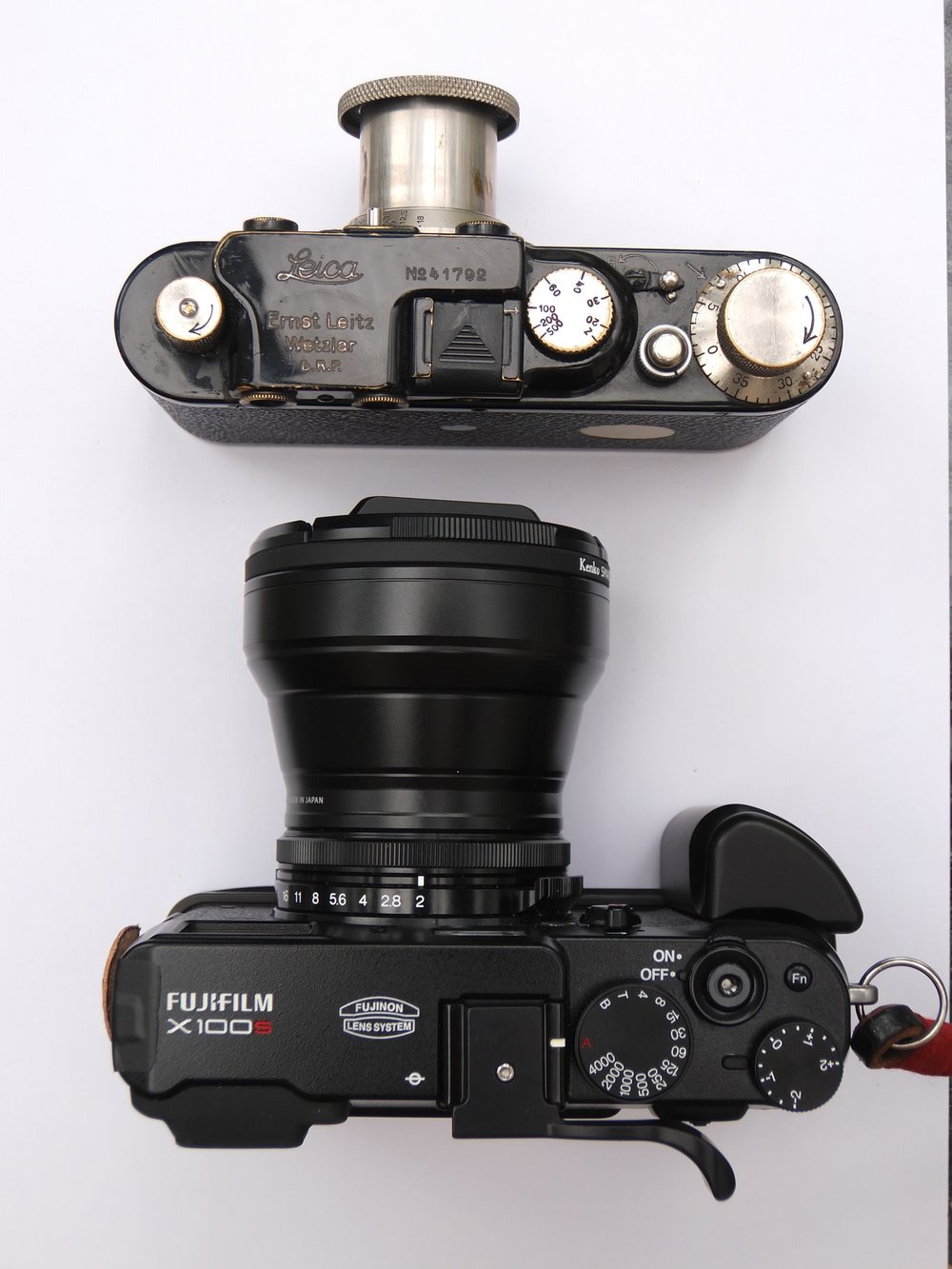X100S with teleconverter dwarfs the 80-year-old Barnack